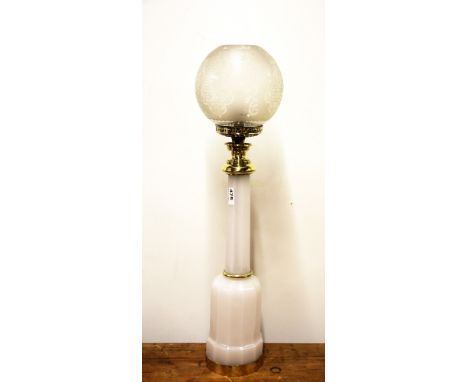 An unusual white opaline glass electric oil lamp style table lamp with etched glass shade.