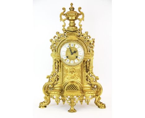 A large gilt brass mantle clock, H. 59cm.