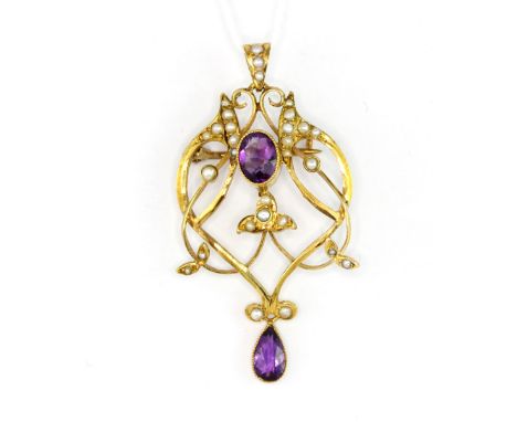 An antique 9ct yellow gold brooch/pendant set with an oval and pear cut amethyst and seed pearls, L. 4.5cm.
