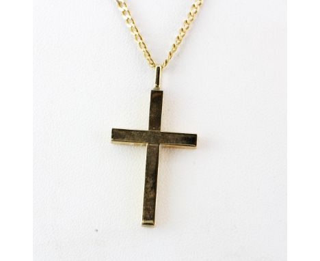 A 9ct yellow gold (stamped 9k) chain with a yellow metal cross pendant (tested gold), L. 64cm. Approx. 7gr.