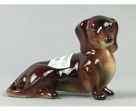 SIX CERAMIC DOG FIGURES