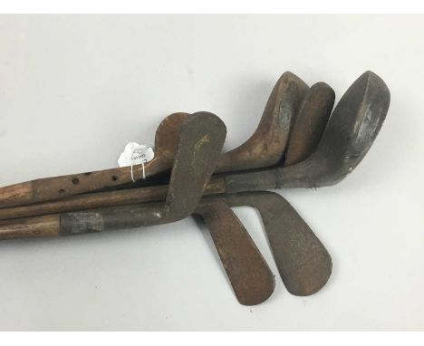 SEVEN VINTAGE HICKORY SHAFT GOLF CLUBS