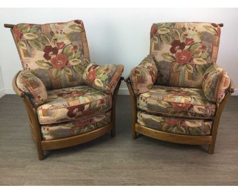 ERCOL MODEL NUMBER 203 BERGERE LOUNGE SUITE,comprising a settee and two armchairs, with upholstered loose cushions