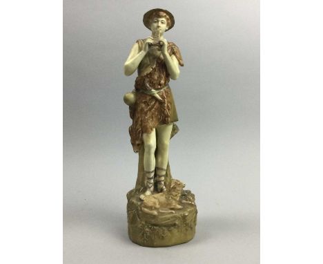 AUSTRIAN CERAMIC FIGURE OF A MALE,33cm high, along with bookends, a carriage clock and Poole dish, contained in a small case