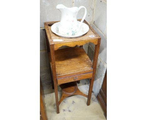 A George III mahogany wash stand with a later jug and basin, overall height 94cm