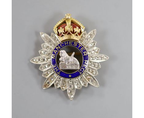 A late 19th/early 20th century yellow metal, enamel and rose cut diamond set 'The Manchester Regt. Egypt' pendant brooch, 32m