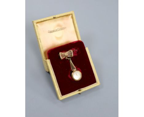 A lady's 9ct gold Jaeger LeCoultre manual wind pendant watch on a 9ct gold suspension brooch, overal 50mm, gross weight 13.3 