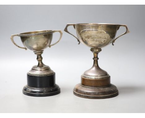 Two early to mid 20th century silver two handled presentation trophy cups, tallest 14cm (a.f.),gross 12.5oz, both with wooden