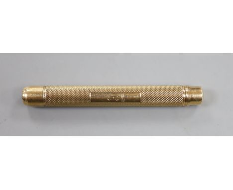 A 1950's engine turned 9ct gold pencil, maker, EB, London, 1956, 78mm, gross 19.2 grams.