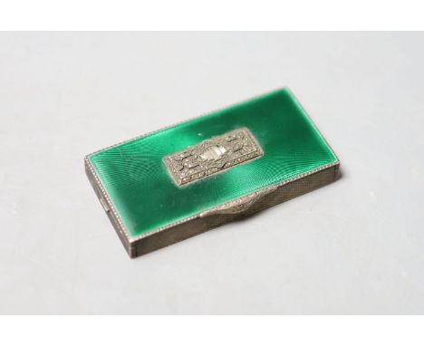 A 1930's engine turned  silver, green enamel, marcasite and paste set minaudiere, lacking mirror and lipstick, import marks f