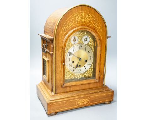 A German rosewood and marquetry chiming mantel clock, early 20th century,45cm