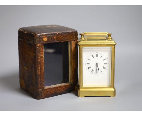 An early 20th century lacquered brass carriage clock, cased