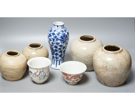 A Chinese blue and white vase, Xuande mark, c.1900, two late 19th Century Chinese cups and four Chinese provincial earthenwar
