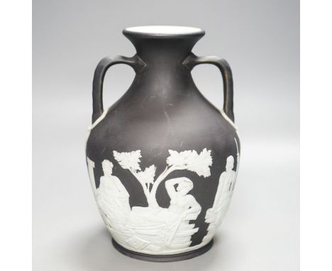A Wedgwood black Jasper ware copy of the Portland vase, first half 19th century,20cm