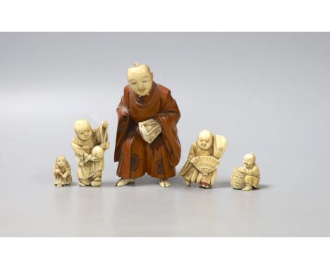 Three Japanese ivory netsuke, a similar okimono and a boxwood and ivory okimono, 9cm (losses)