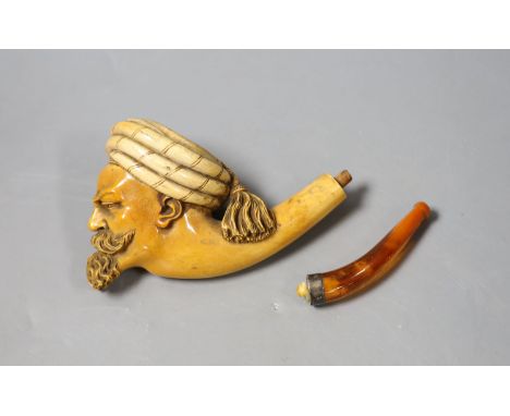 A late 19th century Meerschaum pipe of an Arab gentleman, 14cm