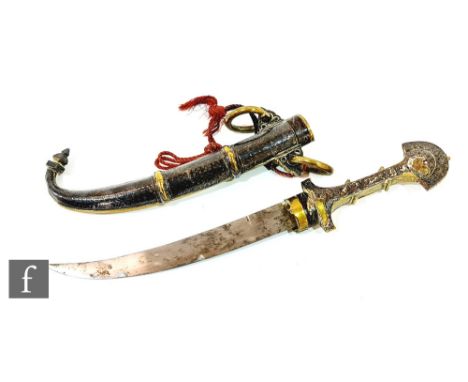 A late 19th and early 20th Century Indian dagger with brass scabbard, the handle with silver inlay, blade 21cm, A/F. 