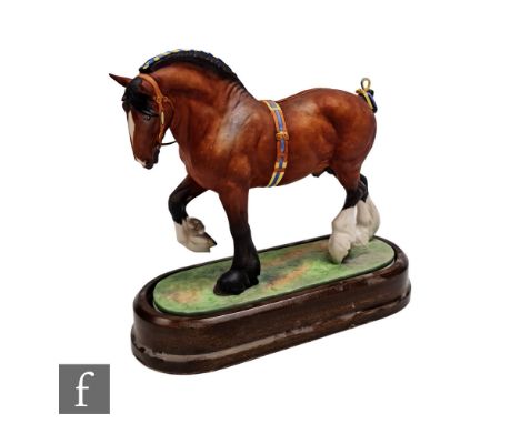 A Royal Worcester equestrian model Shire Stallion, modelled by Doris Lindner, printed mark, height 24cm, length 24cm. 