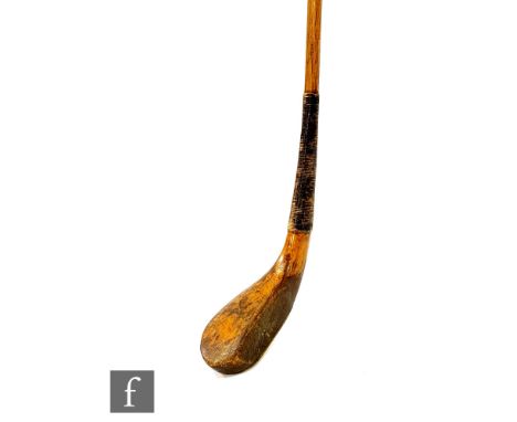 A 19th Century hickory shafted golf putter, stamped R Forgan, length 108cm.