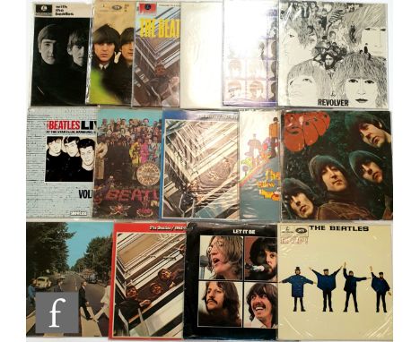 A collection of The Beatles LPs, mostly later and re-issues, to include 'Revolver', 'Rubber Soul', 'Help', 'Abbey Road' and '