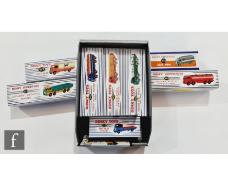 A collection of eight Atlas Edition Dinky Toys diecast models, all commercial vehicles, comprising 942 Foden 14-Ton Tanker, 9