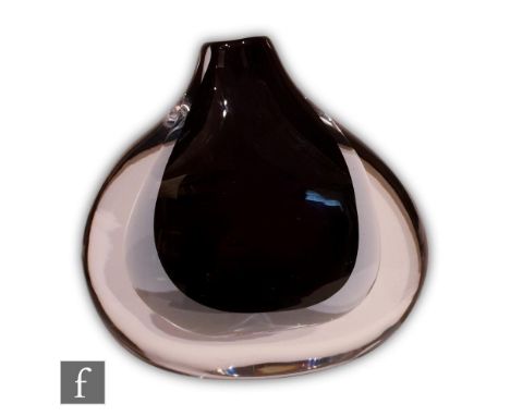 A post war Kosta sommerso glass vase designed by Vicke Lindstrand, of compressed form with collar neck, the deep amethyst cor
