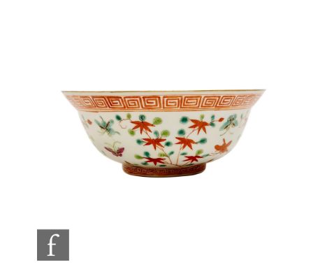 A Chinese famille verte bowl, (Tongzhi 1862-1874) seal mark to base, decorated with red flowering vines, with crane to the in