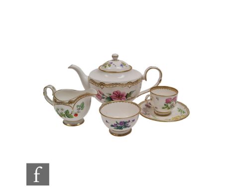 A Royal Worcester Sandringham tea for one comprising a teapot, one cup and saucer, milk jug, sugar bowl, sandwich or cake pla