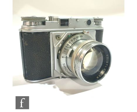 A Voigtländer Prominent 35mm rangefinder camera, serial number B3654, with Nokton 1:1.5/50mm lens, serial number 3977303, wit