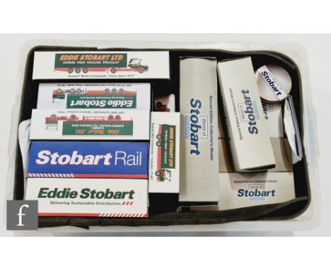 Twenty two Atlas Editions Eddie Stobart diecast models, all 1:76 scale, all boxed, with related DVD, coasters and notebook. (