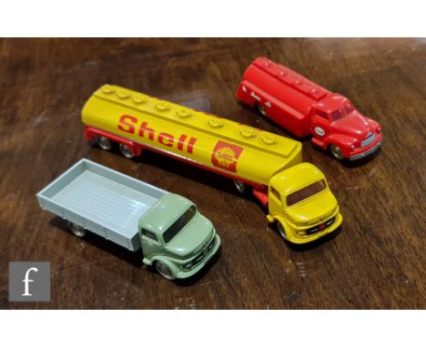 Three Lego HO scale commercial vehicles, comprising Mercedes Shell Articulated Tanker, Esso Tanker and Mercedes Open Wagon in