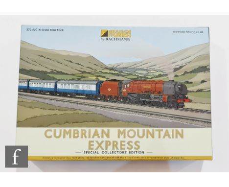 An N Gauge Graham Farish 370-500 Cumbrian Mountain Express Train Pack, comprising 4-6-2 BR maroon Coronation Class Duchess of