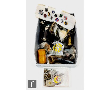 A collection of motorcycle enamel led badges to include Velocette, also watch keys, AA badge and assorted items. (qty) 