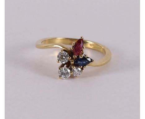 An 18 kt 750/1000 gold ring with 3 brilliants totaling 0.36 ct G-VS/SI, a marquise cut ruby and blue sapphires. Ring size 17.