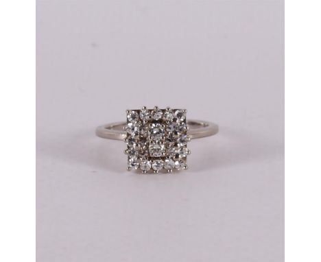 An 18 kt 750/1000 gold ring with 2 brilliants and 24 octagon cut diamonds of 0.75 ct H-VS in total. Ring size 17 mm.