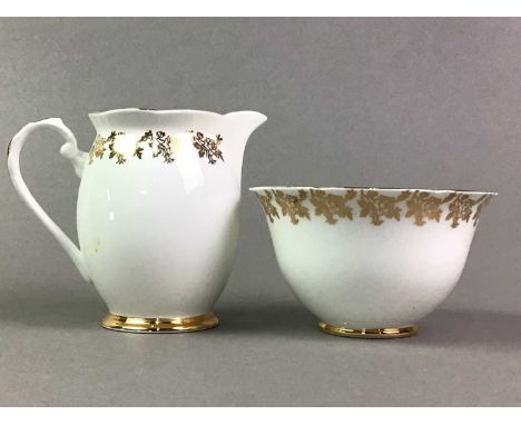 ROYAL ALBERT PART TEA SERVICE ALONG WITH A ROYAL TRON PART TEA SERVICE  the services each with gilt decoration on a white gro