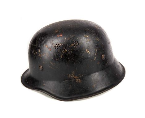 GERMAN STAHLHELM with internal webbing and chin strapThe helmet is not dented. Lining is damaged, visible on images.  Straps 