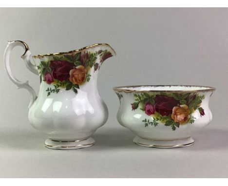 ROYAL ALBERT TEA SERVICE OLD COUNTRY ROSES PATTERN  along with a Royal Albert Lily of the Valley pattern sugar and cream