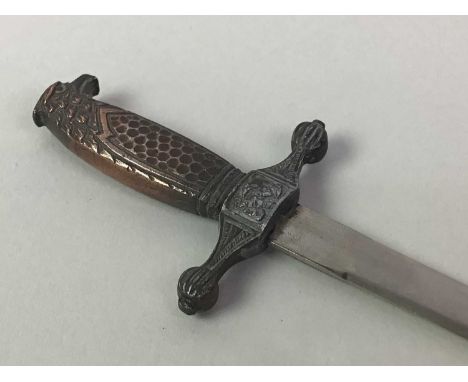 TWO PAPER KNIVES one possibly German in the model of a sword, the second with parcel gilt detail