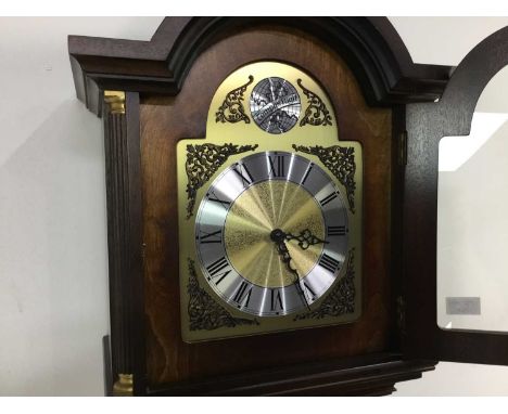 REPRODUCTION MAHOGANY LONGCASE CLOCK Tempus Fugit, with decorative brass face depicting Roman numerals198cm high