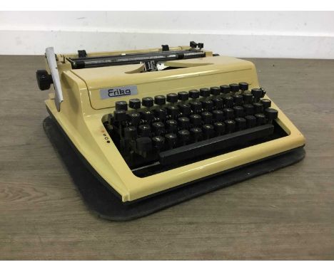 VINTAGE ERIKA PORTABLE TYPEWRITER in fitted carry case