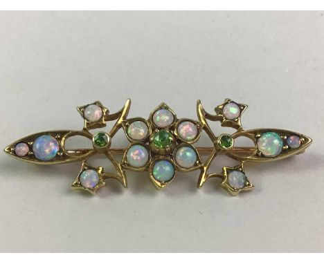 OPAL BROOCH with central flower cluster and pearl sectionsNo stones appear to be missing, it does appear to be missing a smal