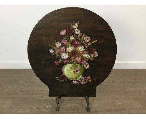 ART DECO OAK FIRESCREEN circular with painted vase of flowers design in relief, on iron supports70cm highCracking to applied 