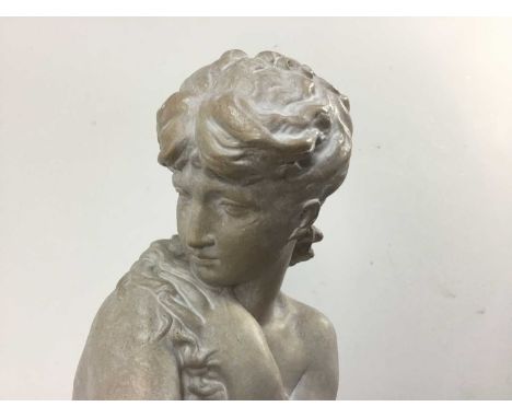 RESIN FIGURE GROUP modelled with a seated female holding flowers on ceramic plinth114cm high