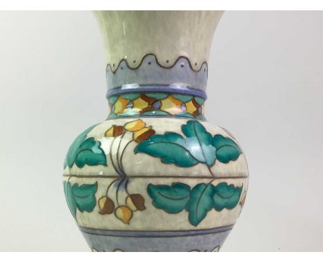 CHAROLTTE RHEAD FOR BURSLEY WARE TABLE LAMP, EARLY TO MID 20TH CENTURY  of baluster form decorated with tube lined stylised f