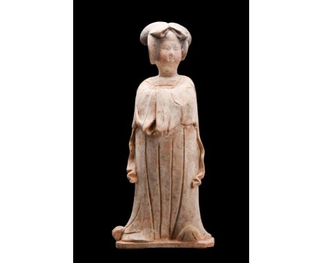 Tang Dynasty, Ca. AD 618-907.A Tang dynasty terracotta figure, commonly known as 'Fat Lady'. The woman stands in in a swayed 