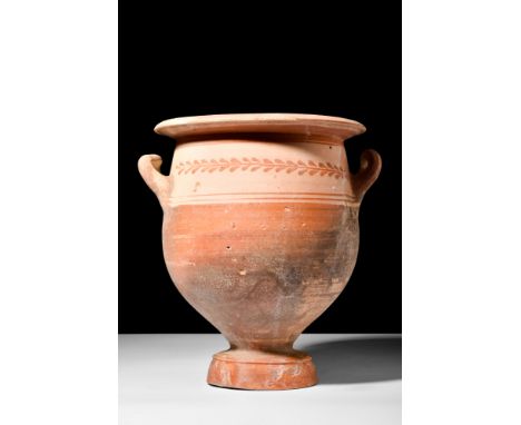 Ca. 350-300 BC.A Daunian pottery krater with a flared rim and an inverted bell-shaped body. The vessel stands on a circular f