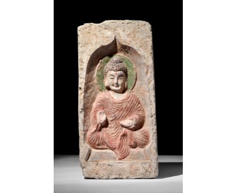 Northern Wei Dynasty, Ca. AD 386-534.A Northern Wei dynasty terracotta brick portraying a seated Buddha performing the Abhaya