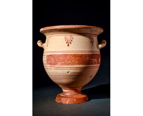 Ca. 350-300 BC.A finely modelled pottery bell krater with a large, rounded body, a broad funnel rim, and twin upraised handle