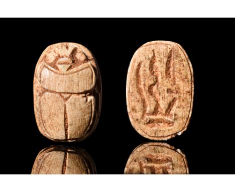 Ca. 2055-1650 BC.A steatite scarab amulet with incised detailing to form a ridged carapace and naturalistic features. The fla